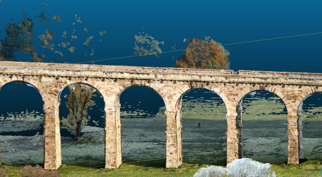 3D point cloud reconstruction of a stone aqueduct structure with arches, captured from LiDAR or photogrammetry.